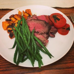 Steak dinner with sweet potatoes, green beans, and tomato salad - yummy!